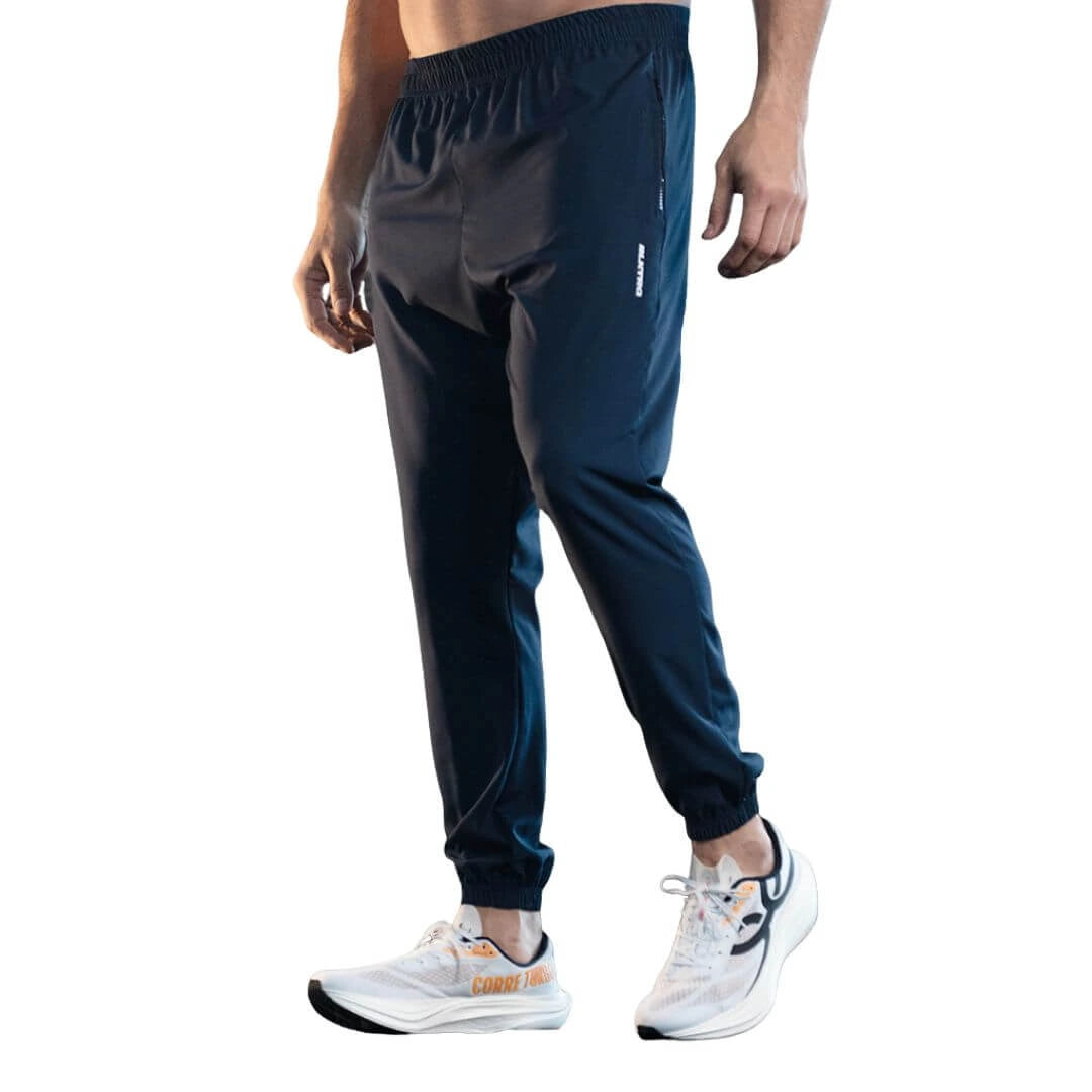 calça para academia em tecido elastano, calça na cor cinza com uma listra na co azul escuro