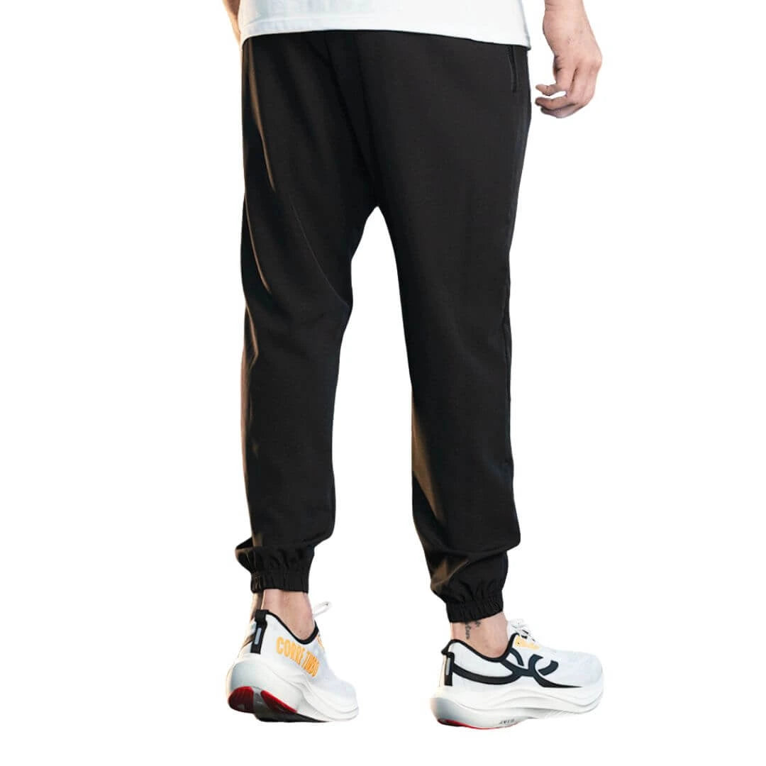 calça para academia em tecido elastano, calça na cor cinza com uma listra na cor preta